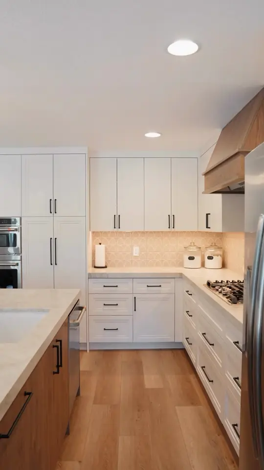 Dark Rockford Hickory on Cotton White kitchen: branded drawer boxes, pantry pull-outs, island storage, tray dividers
