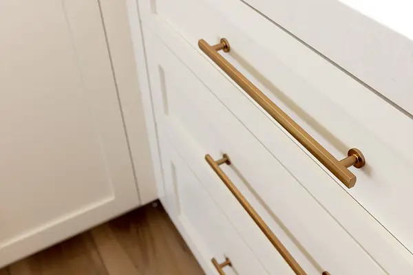 Peterson Cabinet Works Bathroom Emtec pulls white shaker drawers