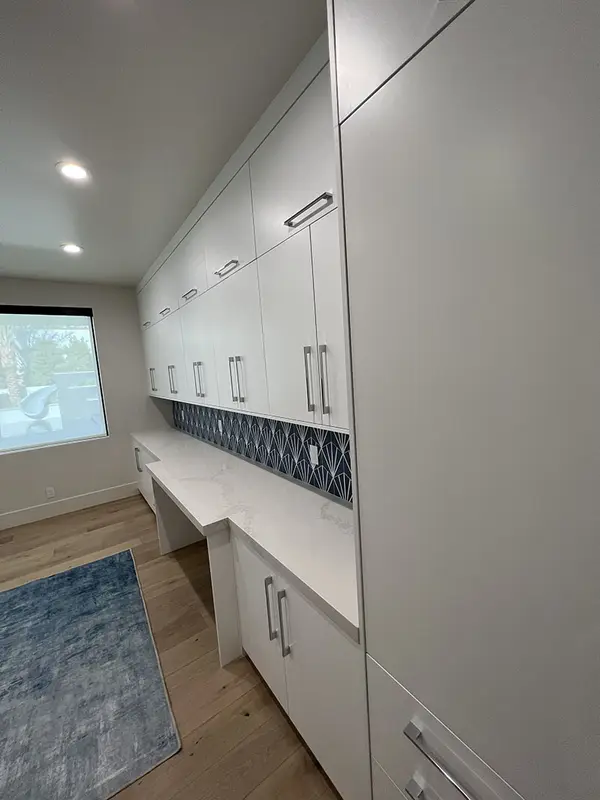 pcw cabinetry Custom white slab laundry