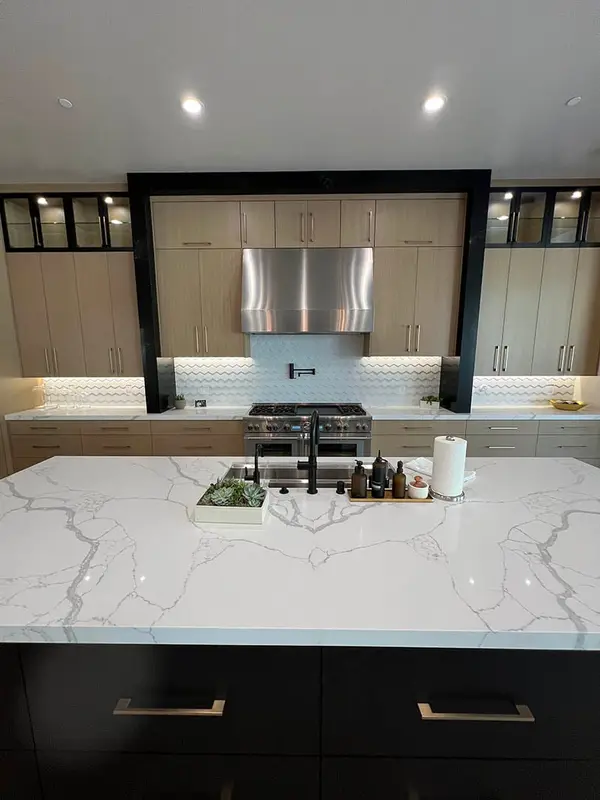 Hammer Matched grain slab rift white oak frameless custom cabinets glass doors LED lights 2