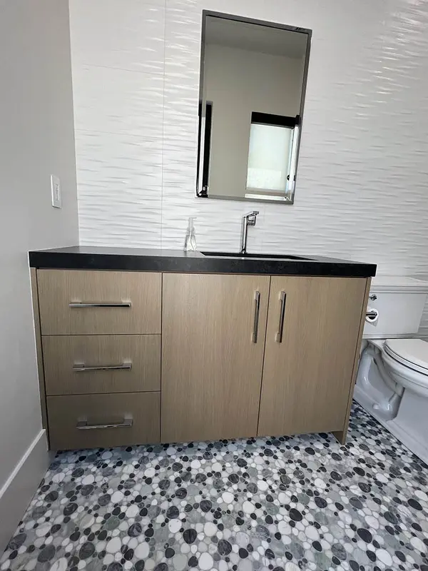Hammer Slab rift white oak matched grain cabinet