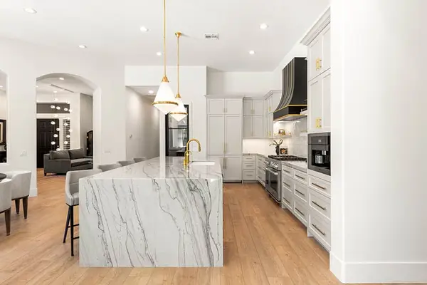Isleworth Custom kitchen waterfall island