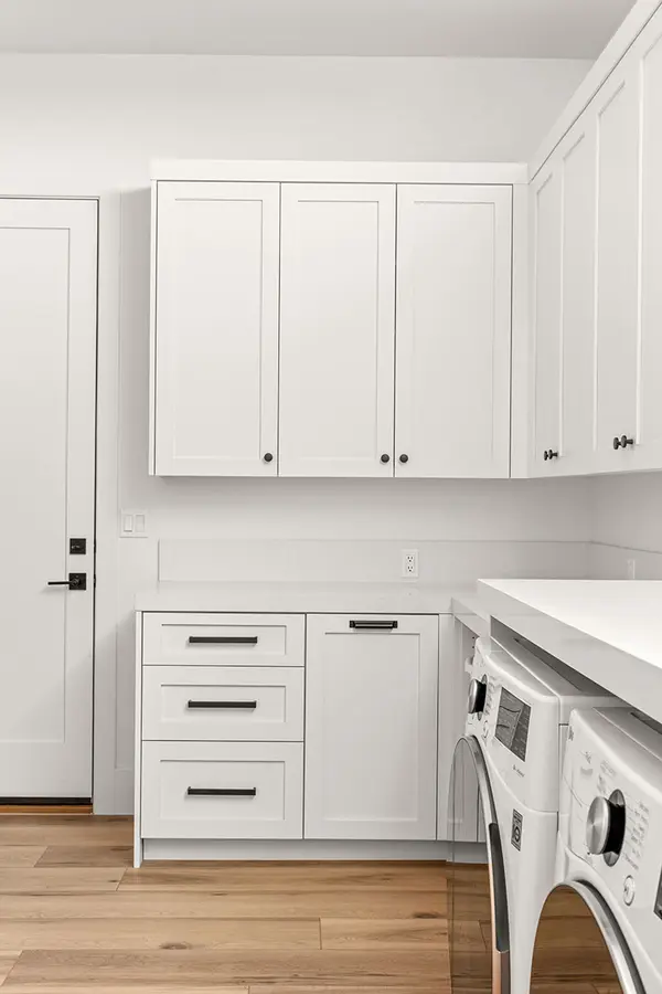 Peterson Cabinet Works Laundry Room Custom white shaker laudnry