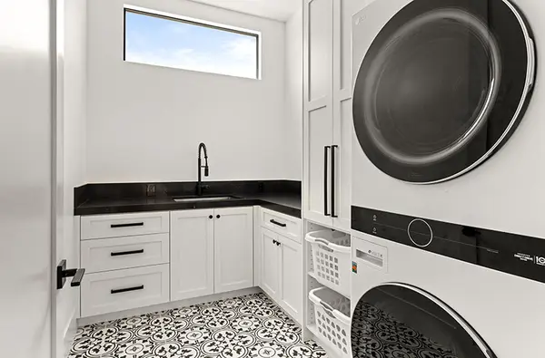 Peterson Cabinet Works Laundry Room Custom white shaker laundry