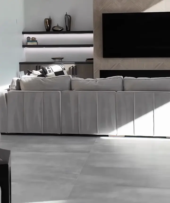 Custom media wall with floating shelves and LED lighting