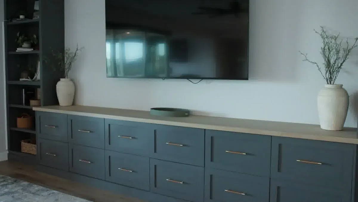 Custom built-in media wall cabinetry with floating shelves in a Las Vegas family home Custom built-in media wall cabinetry with floating shelves in a Las Vegas family home