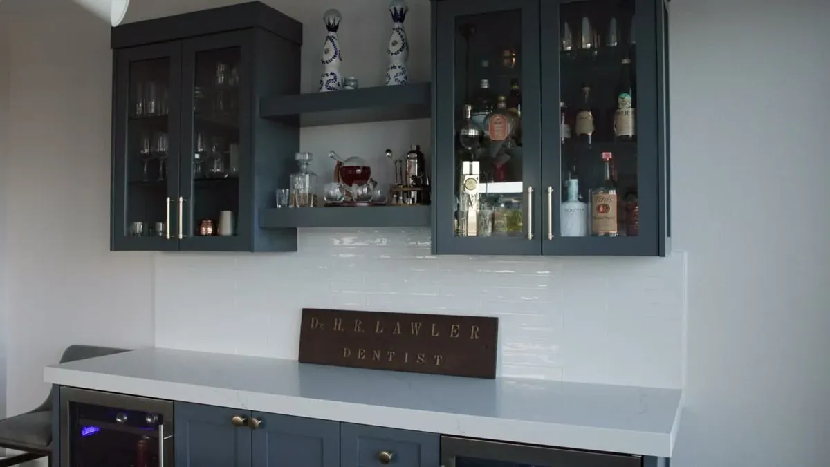 Glass front bar cabinets with brass hardware built by a Las Vegas custom cabinet maker Glass front bar cabinets with brass hardware built by a Las Vegas custom cabinet maker