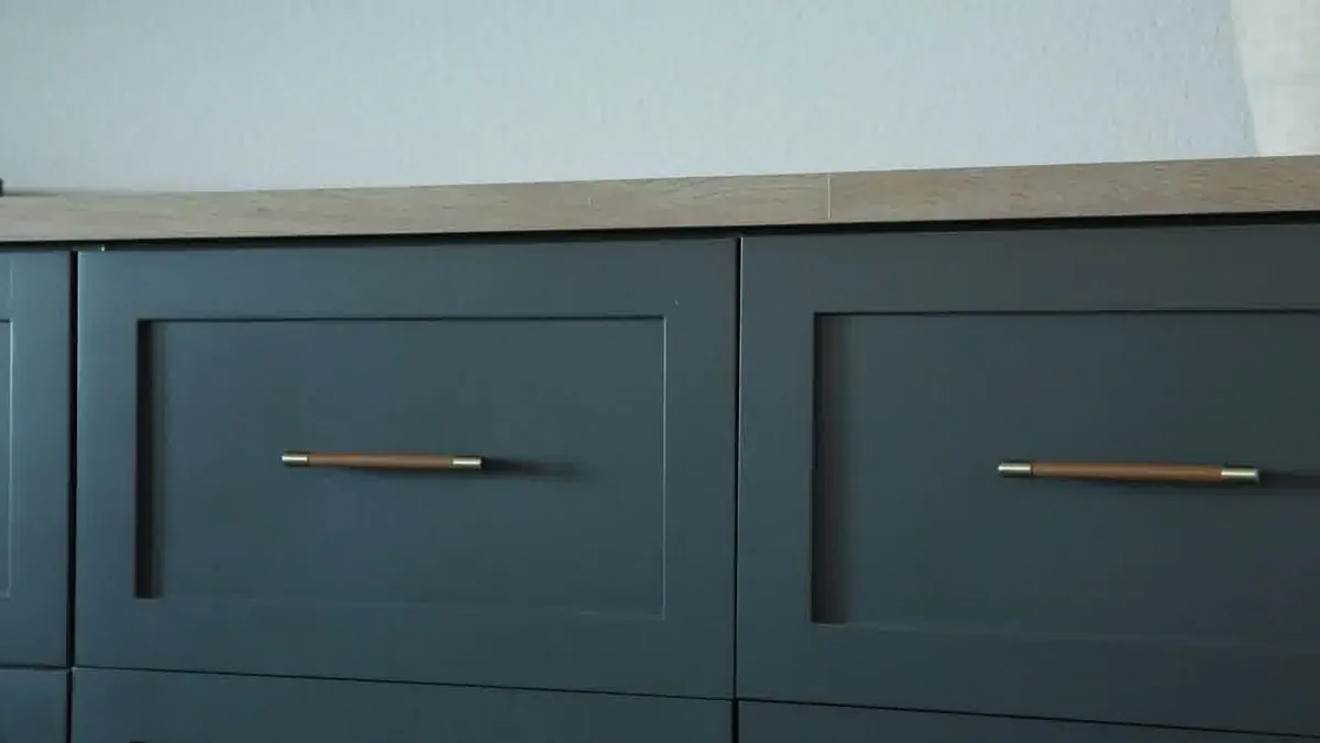 Soft close cabinet drawers with brass pulls in a family kitchen built in Las Vegas Soft close cabinet drawers with brass pulls in a family kitchen built in Las Vegas